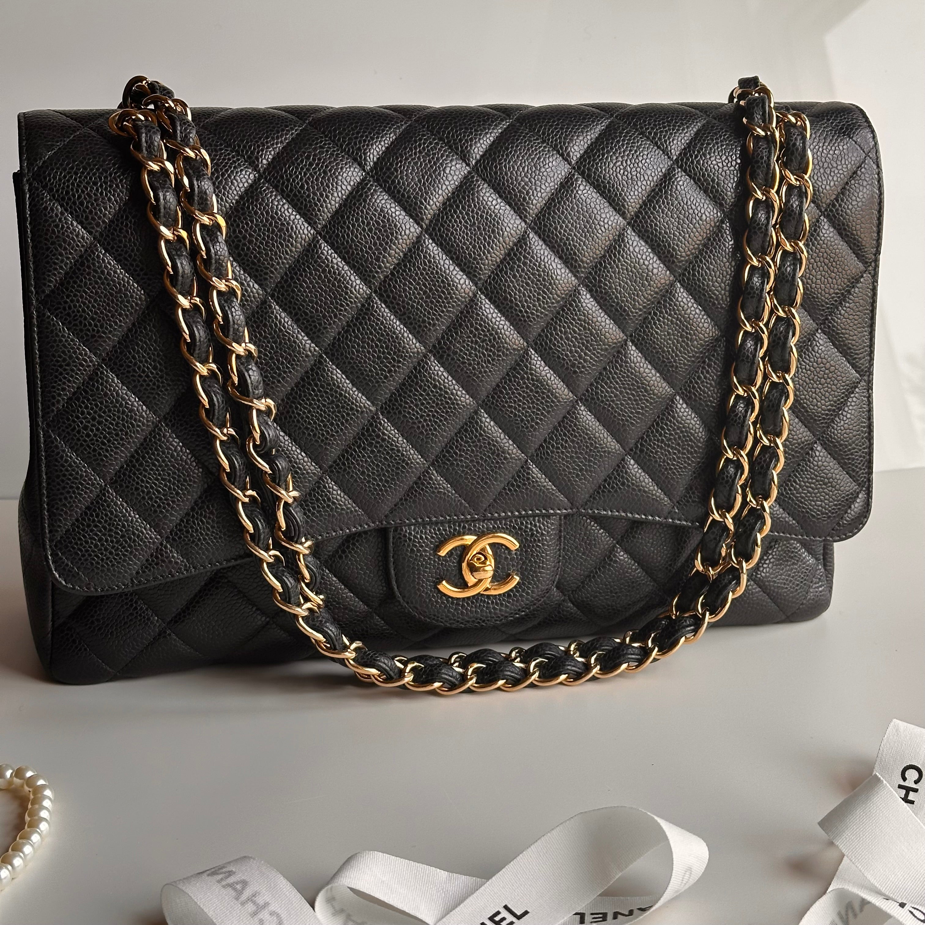 Chanel Maxi Classic Single Flap Black Caviar GHW