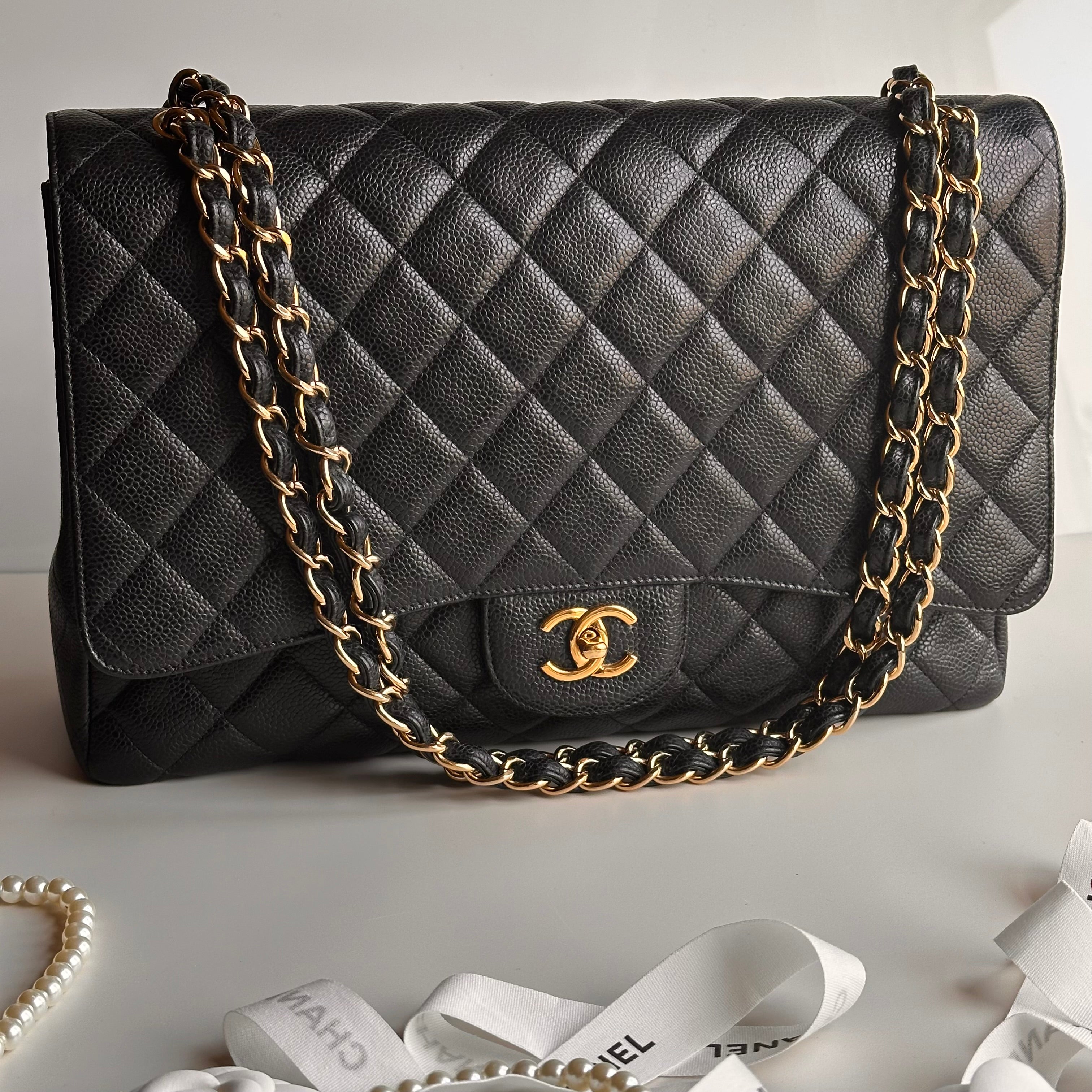Chanel Maxi Classic Single Flap Black Caviar GHW