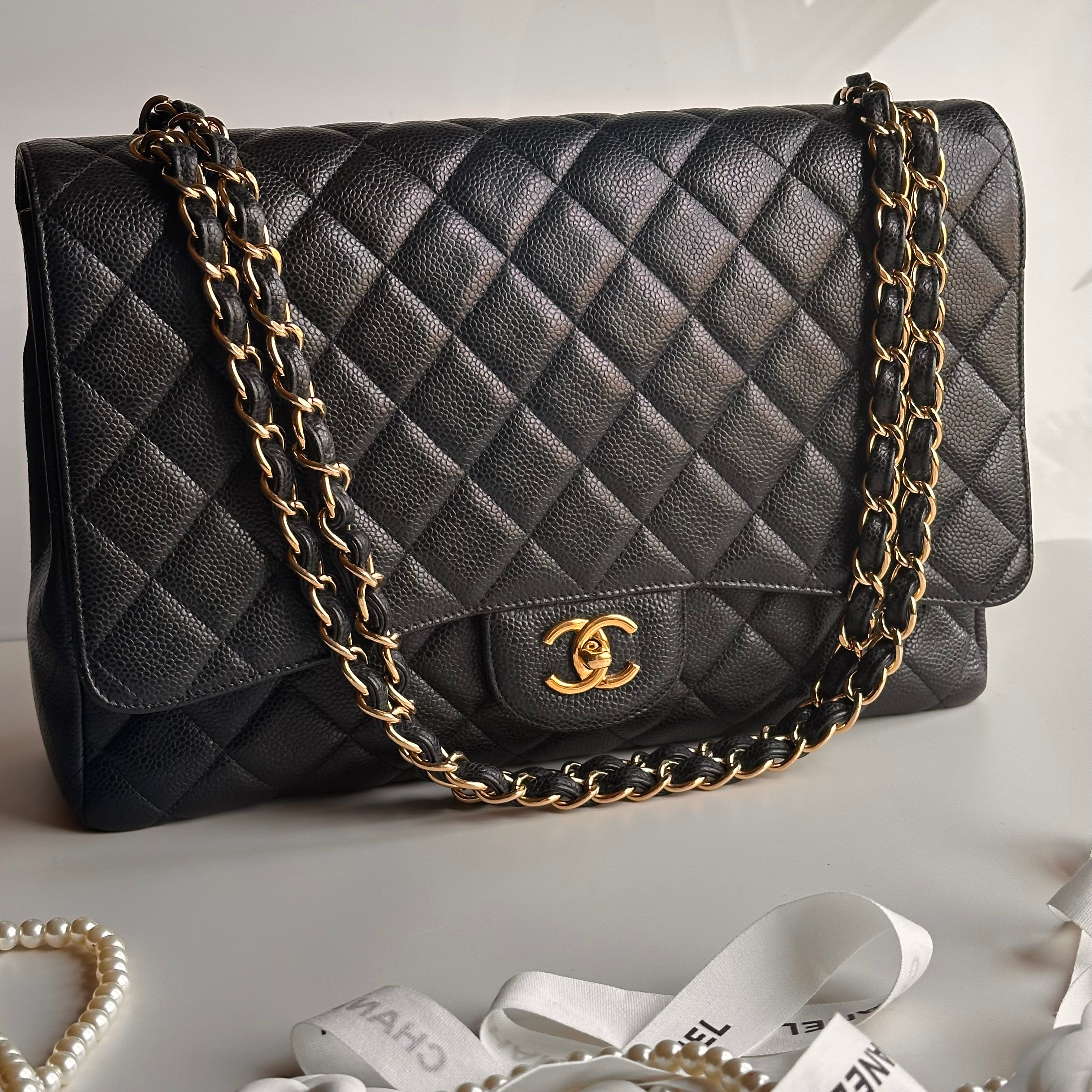Chanel Maxi Classic Single Flap Black Caviar GHW