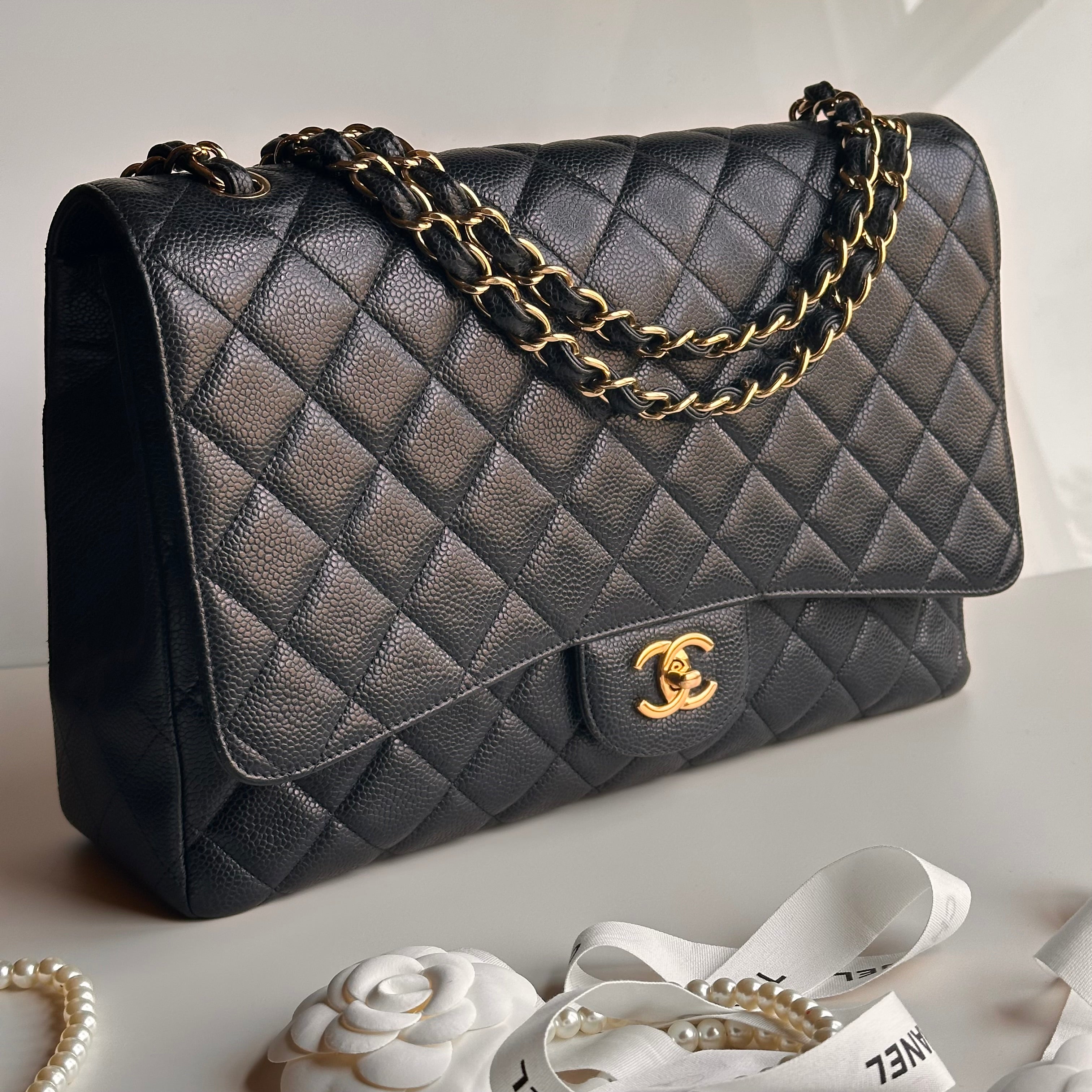 Chanel Maxi Classic Single Flap Black Caviar GHW