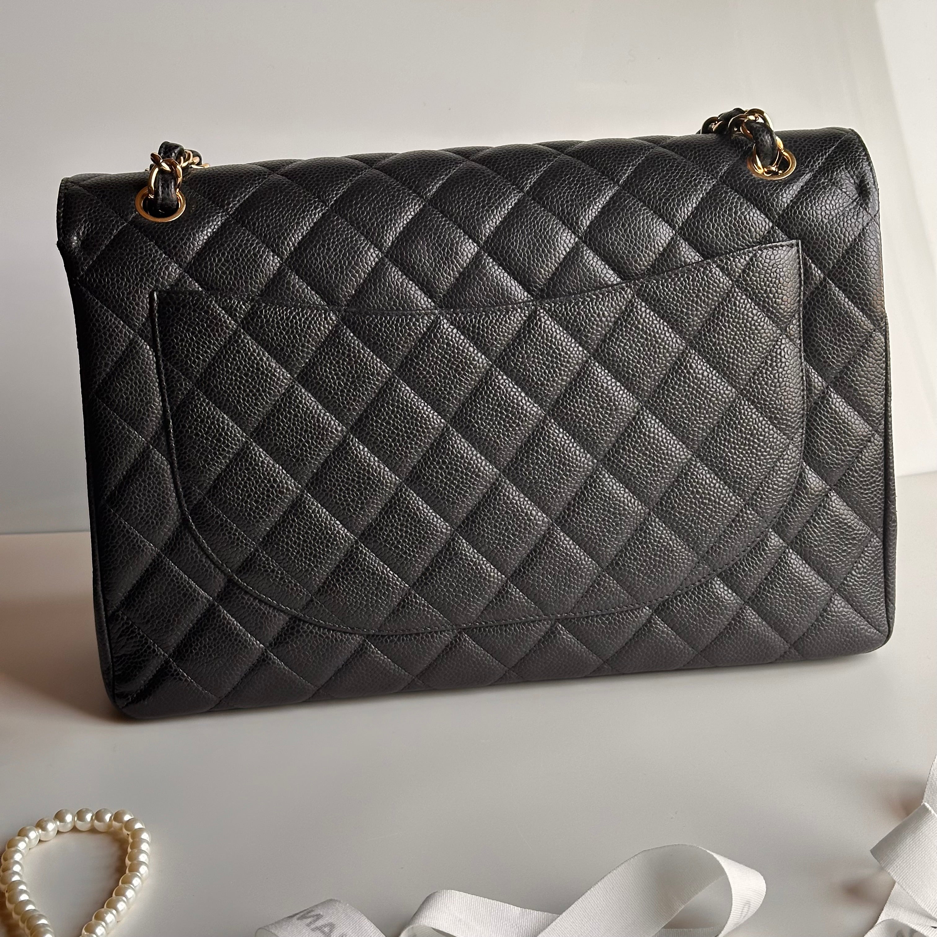 Chanel Maxi Classic Single Flap Black Caviar GHW