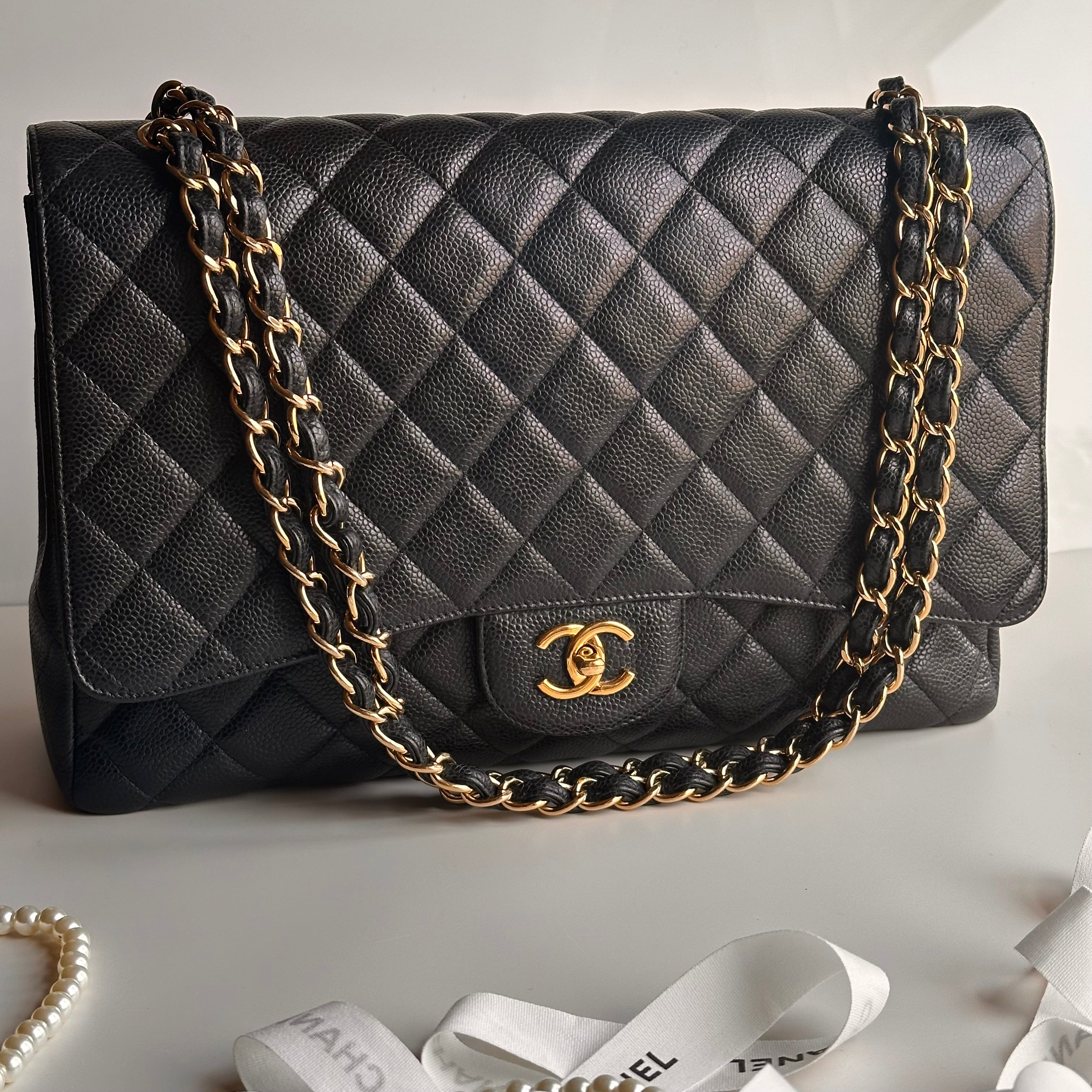 Chanel Maxi Classic Single Flap Black Caviar GHW