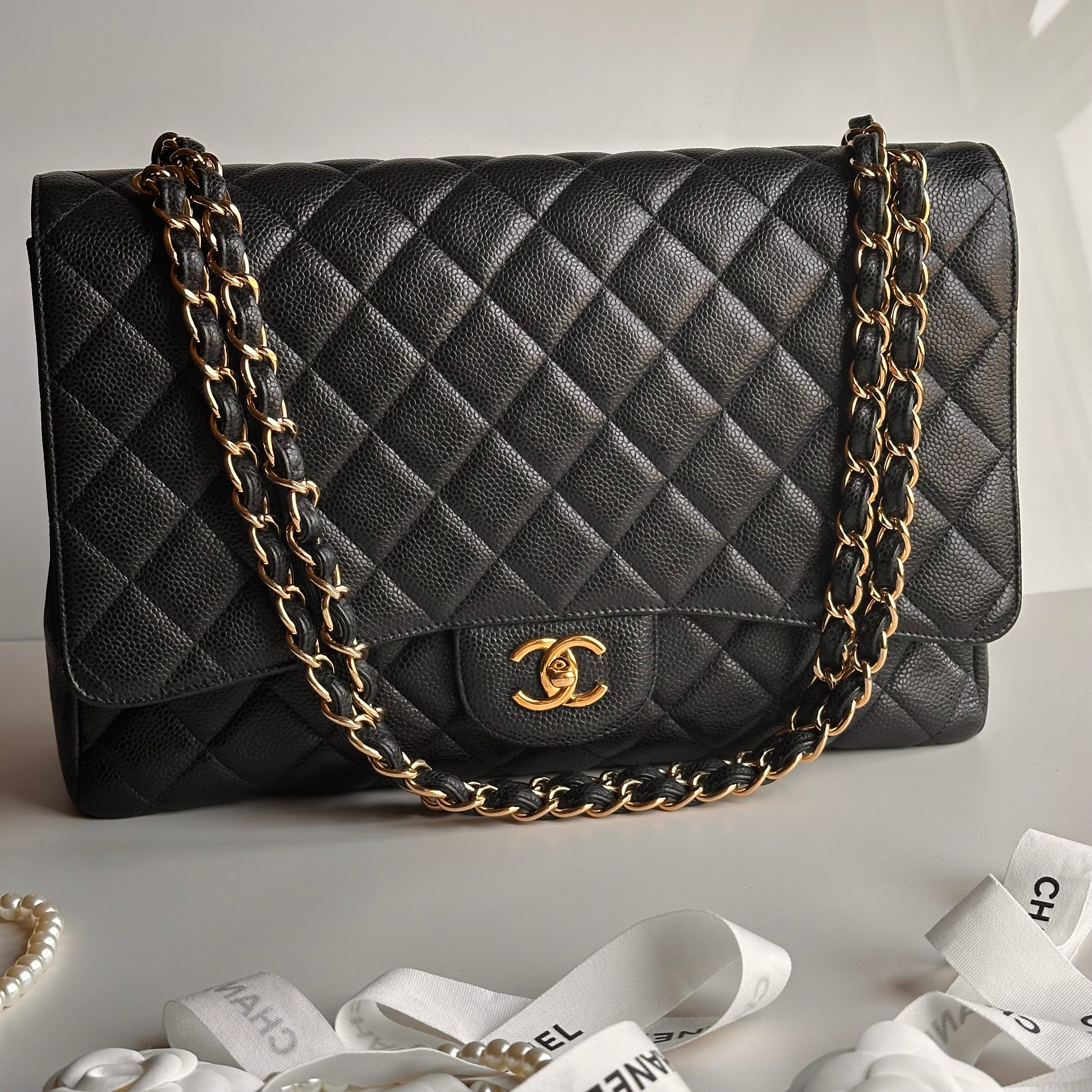 Chanel Maxi Classic Single Flap Black Caviar GHW