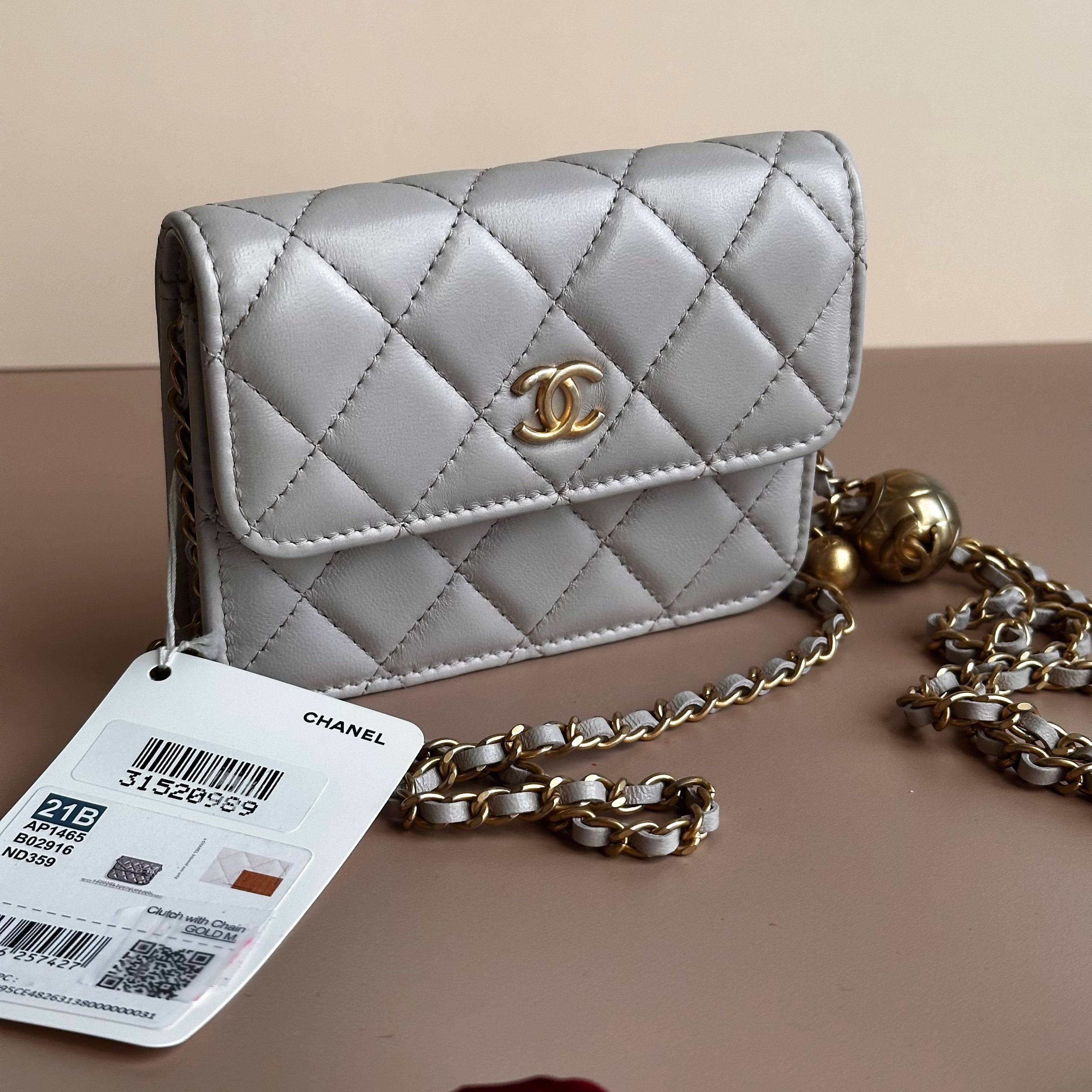 21B Chanel Pearl Crush Mini Clutch with chain lilac lambskin and aged gold hardware