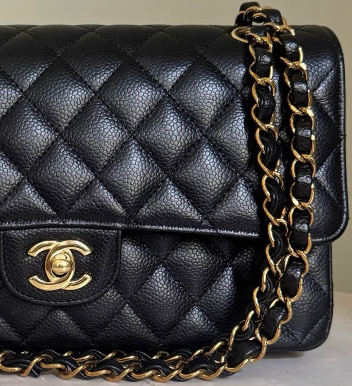 Why the Chain and Lock on Some Chanel Flaps Don’t Match in Color